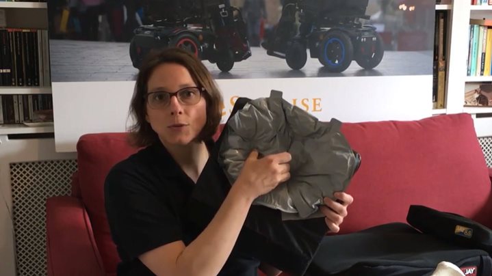 faith holding a Fluid Insert Wheelchair Cushion